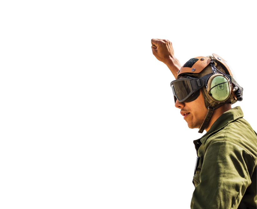U.S. Marine Corps Lance Cpl. Isaiah Maez, a fixed-wing aircraft mechanic with Marine Fighter Attack Squadron 242, Marine Aircraft Group 12, Japan, signals to an F-35B Lightning II aircraft during the Fiscal Year 2023 Korea Flying Training at Gwangju Air Base, Republic of Korea, April 13, 2023. KFT 23 is a combined training event focused on tactical execution of combat missions and is part of the ROK-U.S. alliance's routine, annual training program. (U.S. Marine Corps photo by Cpl. Raymond Tong)