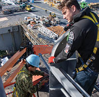 Electronics Technician 3rd Class Gage Pierson (above), from Helena, Montana, assists Information Systems Technician 2nd Class Jeffrey Salguero (below), from Palmdale, California, in the repair of an antenna aboard the aircraft carrier USS Nimitz (CVN 68) while in port at Naval Base Kitsap-Bremerton, Mar. 26, 2024. Nimitz is in port for a scheduled planned incremental availability maintenance period. (U.S. Navy photo by Mass Communication Specialist 3rd Class Peter K. McHaddad)