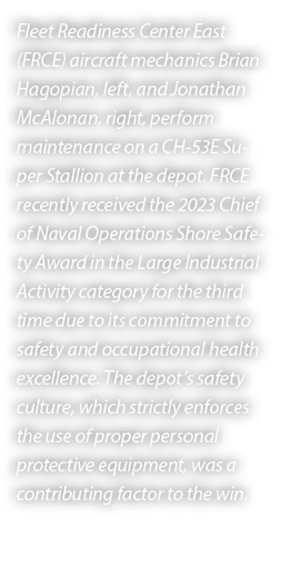 Fleet Readiness Center East (FRCE) aircraft mechanics Brian Hagopian, left, and Jonathan McAlonan, right, perform mai...
