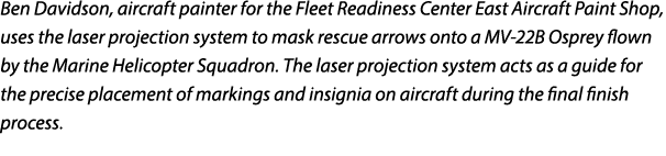 Ben Davidson, aircraft painter for the Fleet Readiness Center East Aircraft Paint Shop, uses the laser projection sys...
