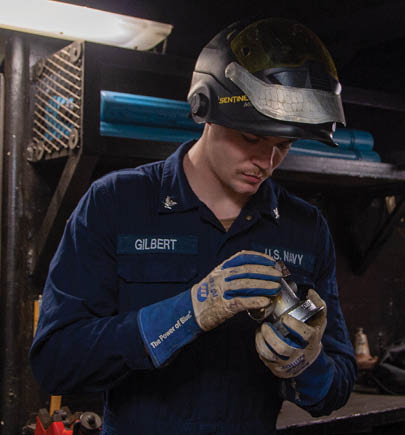 230927-N-JO823-1177 YOKOSUKA, Japan (Sept. 27, 2023) Hull Maintenance Technician 3rd Class Austin Gilbert, from Buda, Texas, adjusts piping in the weld shop of the U.S. Navy’s only forward-deployed aircraft carrier, USS Ronald Reagan (CVN 76), while in-port Commander, Fleet Activities Yokosuka, Japan, Sept. 27, 2023. Ronald Reagan, the flagship of Carrier Strike Group 5, provides a combat-ready force that protects and defends the United States, and supports alliances, partnerships and collective maritime interests in the Indo-Pacific region. (U.S. Navy photo by Mass Communication Specialist 3rd Class Natasha ChevalierLosada)