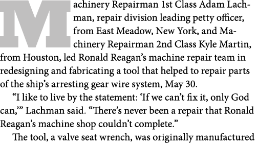 Machinery Repairman 1st Class Adam Lachman, repair division leading petty officer, from East Meadow, New York, and Ma...