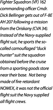 Fighter Squadron (VF) 162 commanding officer Cmdr. Dick Bellinger gets out of F 8E AH 207 following a mission from th...