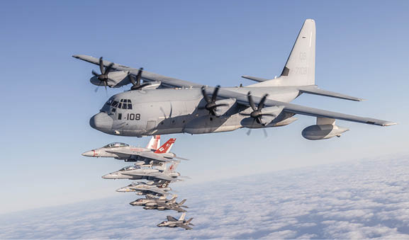 U.S. Marines and aircraft with Marine Aircraft Group 11, 3rd Marine Aircraft Wing, conduct a formation flight as part of Project Legacy off the coast of San Diego, March 4, 2025. The Project Legacy flight was a unique opportunity for all aircraft platforms across MAG-11 to fly as one team, practice tight formations, and take part in the documentation of a historical flight. (U.S. Marine Corps photo by Lance Cpl. Jennifer Sanchez)