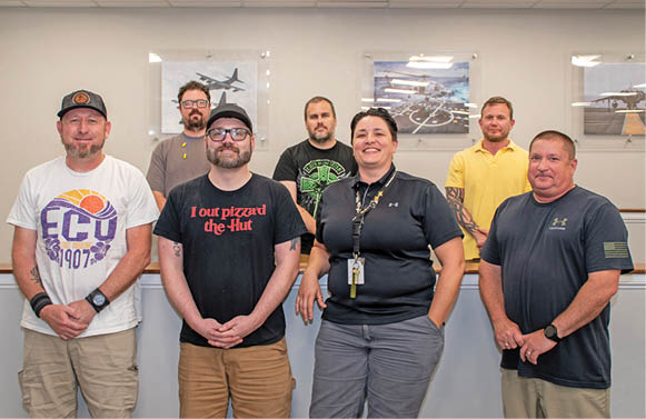 Members of the Fleet Readiness Center East (FRCE) Maintenance, Repair and Overhaul Production Department workforce who earned recognition for their contributions to the Beneficial Suggestion Program included, from left to right: Jason Hollingsworth, Patrick Baker, Robert Conley, Randall Chaney, Crystal Gent, Horace Jackson and Christopher Murphy.