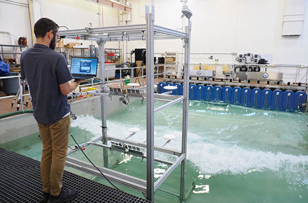 U.S. Naval Research Laboratory (NRL)-National Research Council (NRC) Postdoctoral Fellow with NRL’s Chemistry Division, Center for Corrosion Science and Engineering, Alex Johnson, studies the impact of corrosion from saltwater aerosols at the NRL Laboratory for Autonomous Systems Research (LASR) Littoral Bay Wave Pool, in Washington, D.C., Sept. 24, 2024. RELEASED