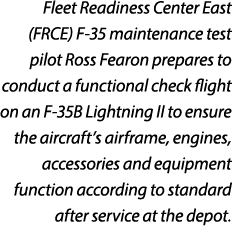 Fleet Readiness Center East (FRCE) F 35 maintenance test pilot Ross Fearon prepares to conduct a functional check fli...