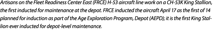 Artisans on the Fleet Readiness Center East (FRCE) H 53 aircraft line work on a CH 53K King Stallion, the first induc...