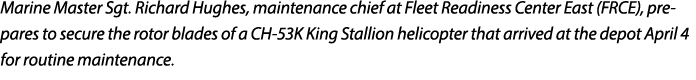 Marine Master Sgt. Richard Hughes, maintenance chief at Fleet Readiness Center East (FRCE), prepares to secure the ro...