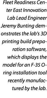 Fleet Readiness Center East Innovation Lab Lead Engineer Jeremy Bunting demonstrates the lab’s 3D printing build prep...