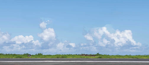 250525-N-NA545-1009 IWO To, Japan (May 25, 2025) A U.S. Navy F-35C Lightning II assigned to Strike Fighter Squadron(VFA) 147 and attached to Carrier Air Wing (CVW) 5, prepares to land during a field carrier landing practice (FCLP) at Iwo To, Japan, May 25, 2025. FCLP is a required flight training for pilot qualification and proficiency that precedes aircraft carrier landing operations, ensuring warfighting readiness in support of regional security and stability in the U.S. Indo-Pacific region. (U.S. Navy photo by Mass Communication Specialist 2nd Class Dyxan K. Williams)