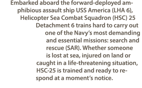 Embarked aboard the forward deployed amphibious assault ship USS America (LHA 6), Helicopter Sea Combat Squadron (HSC...