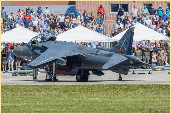 A U.S. Marine Corps AV-8B Harrier II with Marine Attack Squadron (VMA) 223, Marine Aircraft Group 14, 2nd Marine Aircraft Wing, sits in front of a crowd at Marine Corps Air Station Cherry Point, June 3, 2026. The “sundown” of the AV-8B Harrier II, an iconic aircraft that has supported joint and Marine Corps operations for over 40 years, also represents the dawn of a new era; it paves the way for 2nd MAW’s full transition to the F-35B and C Lightning II. VMA-223 is the U.S. Marine Corps' last operational Harrier squadron. (U.S. Marine Corps photo by Lance Cpl. Bryan Giraldo)