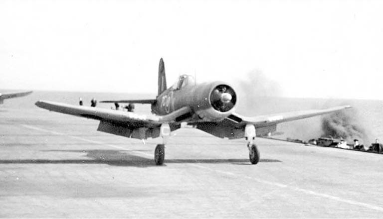 An old airplane is on the runway, with a person standing nearby. AI generated content