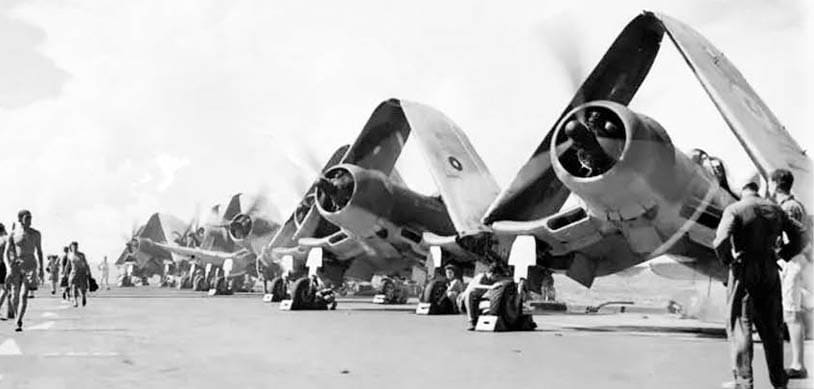 A group of people are standing on a runway next to several airplanes. AI generated content