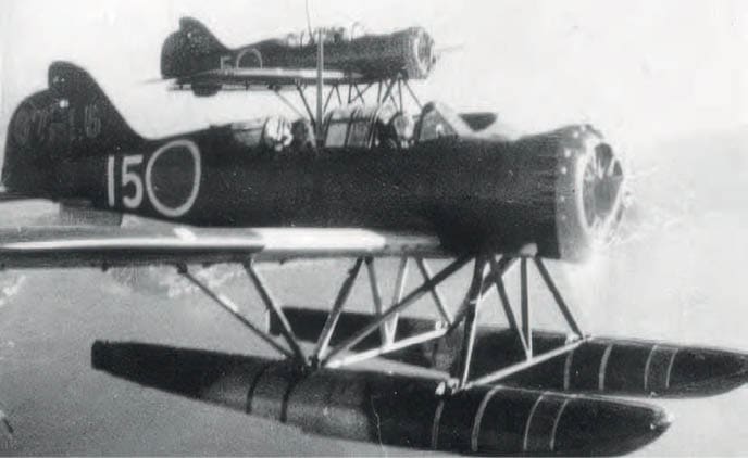 An old airplane with a number 15 on the side is shown in a black and white photo. The plane is in the air with another plane underneath it. AI generated content