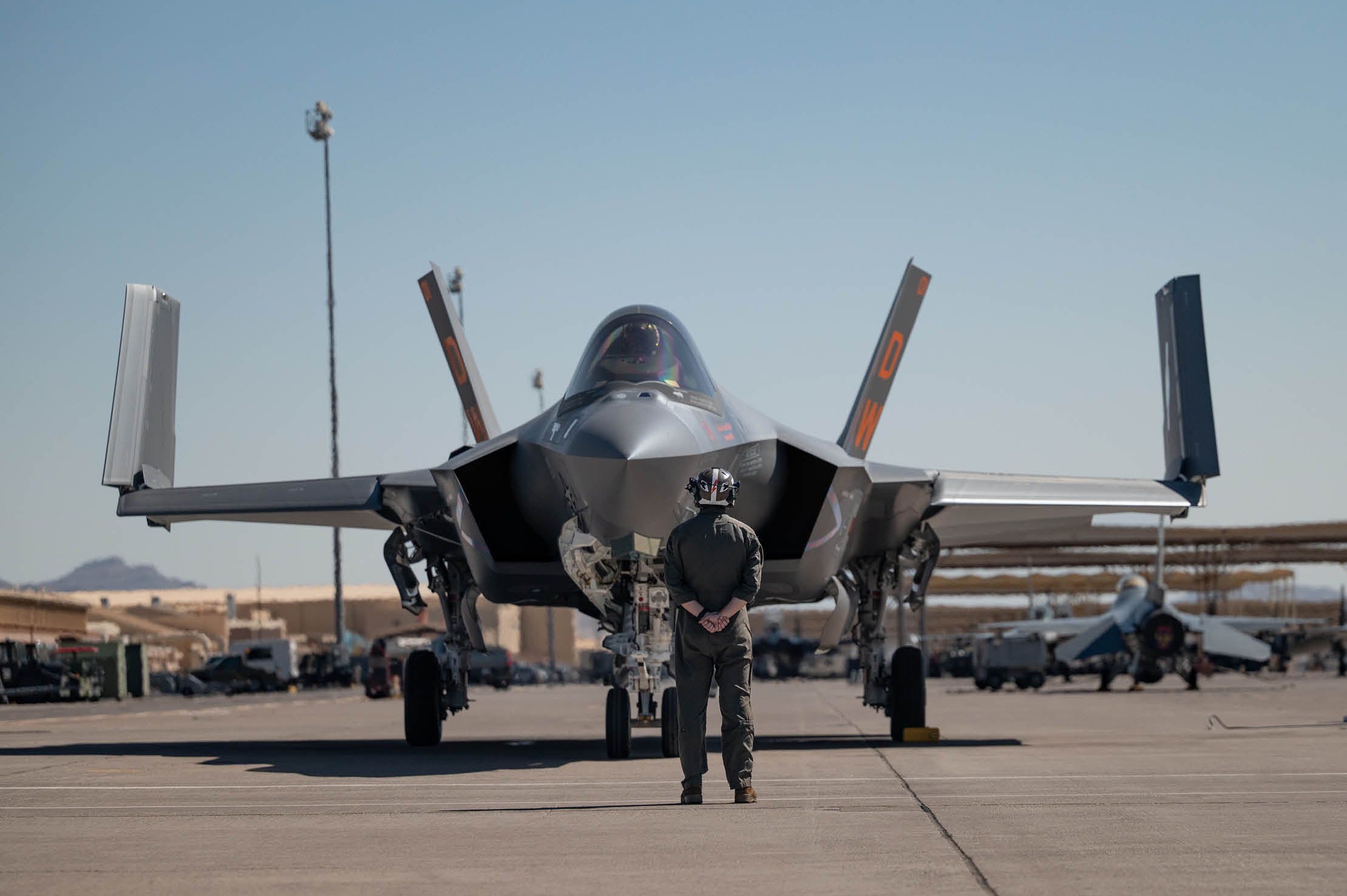 U.S. Marine Corps Staff Sgt. Justin Braun, a powerline mechanic assigned to Marine Fighter Attack Squadron (VMFA) 251, 2nd Marine Aircraft Wing, Marine Corps Air Station Cherry Point, North Carolina, inspects an F-35C Lightning II prior to a mission in support of Red Flag-Nellis 25-3 at Nellis Air Force Base, Nevada, July 22, 2025. Red Flag strengthens integration among joint force partners to maximize strategic capabilities, readiness and lethality. (U.S. Air Force photo by Airman 1st Class Jennifer Nesbitt)